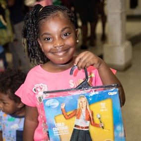 1031 consortium baton rouge young black girl with donated halloween costumes